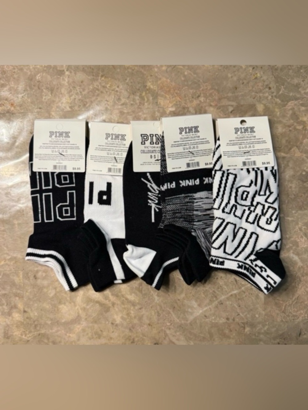 New Pink Victoria’s Secret Socks
With tags 
New Pink socks 
5 pairs included
